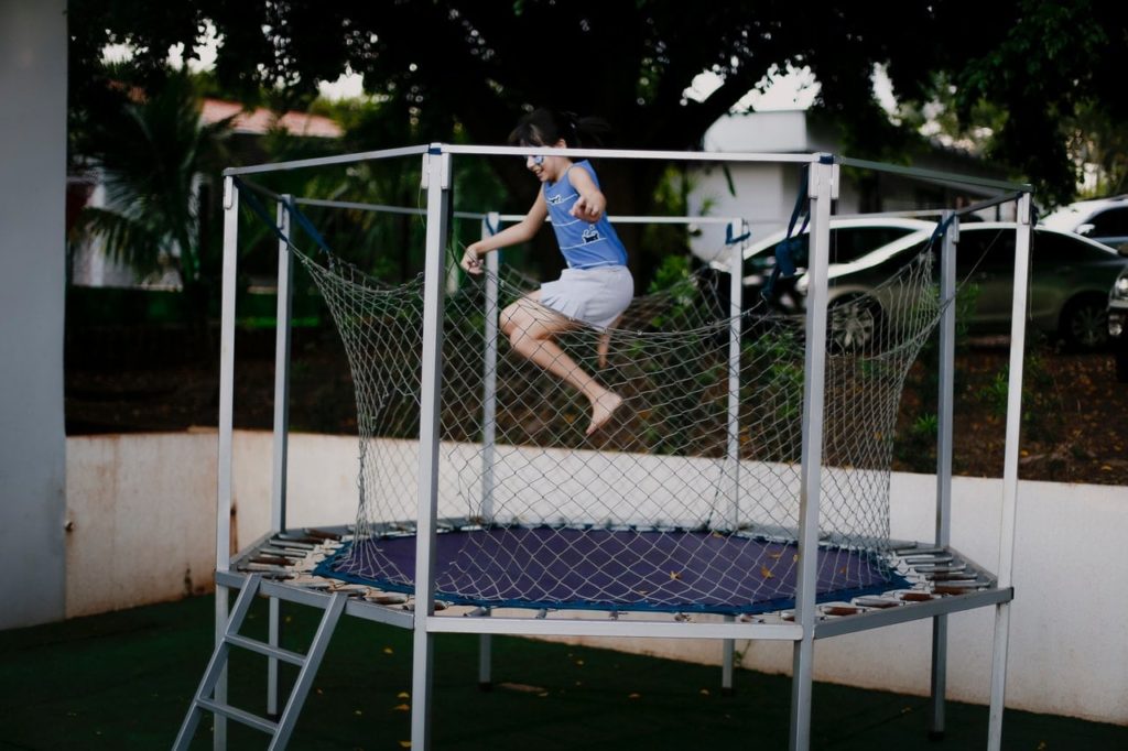 The trampoline provides calming, rhythmic movement.