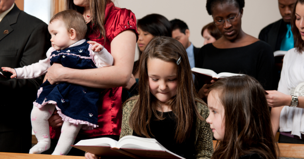 Getting Kids to Behave in Church 3 family with kids worshiping together in church