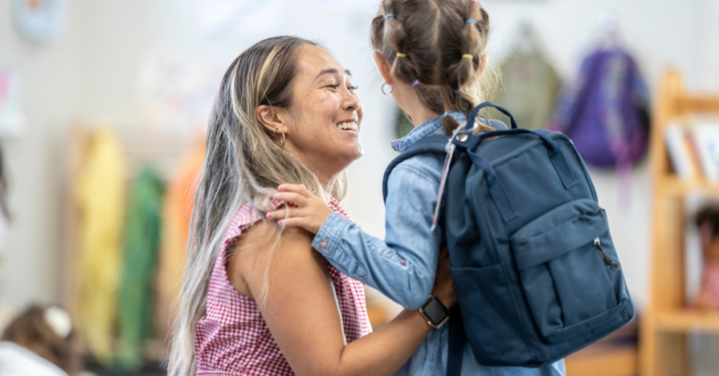 Help! My Anxious Child Cries When Dropped Off at Daycare 3 separation anxiety—parents helping a child settle into their classroom