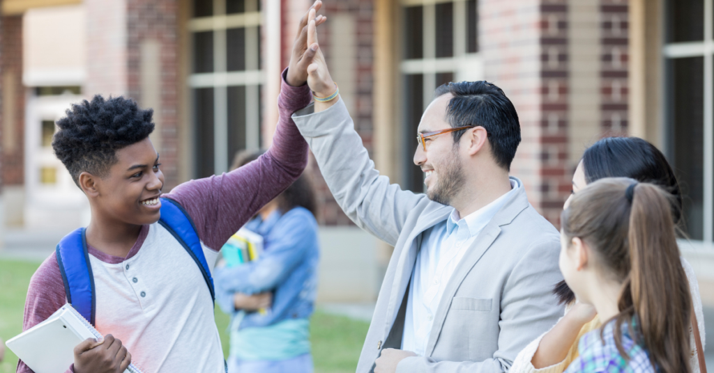 teaching inspiring love in the classroom, proactively connecting with students with a high-five